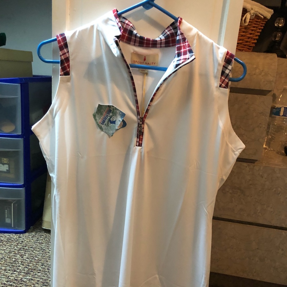 NWT. Smoke free home woman’s golf /outdoor shirt.